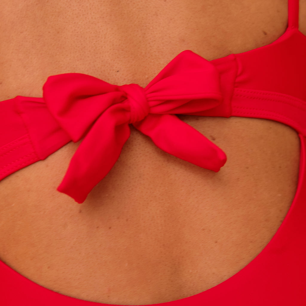 Bow detail on a swimsuit, made with sustainable materials, made in Spain