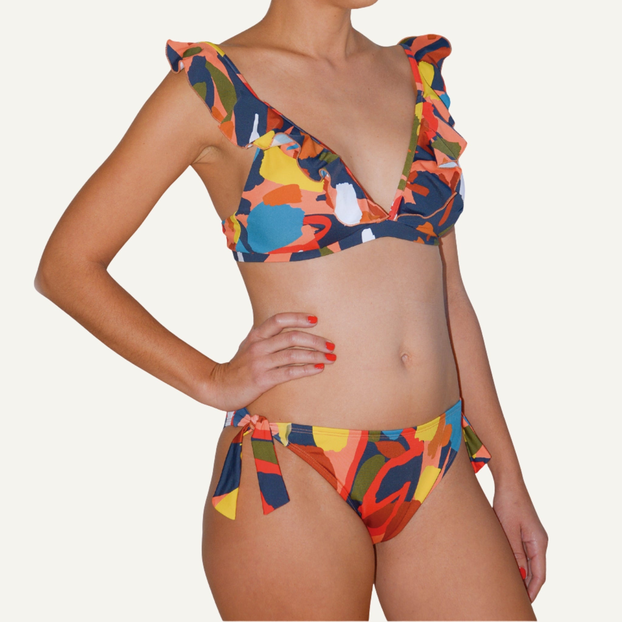 Colorful nursing and maternity bikini set on a white background