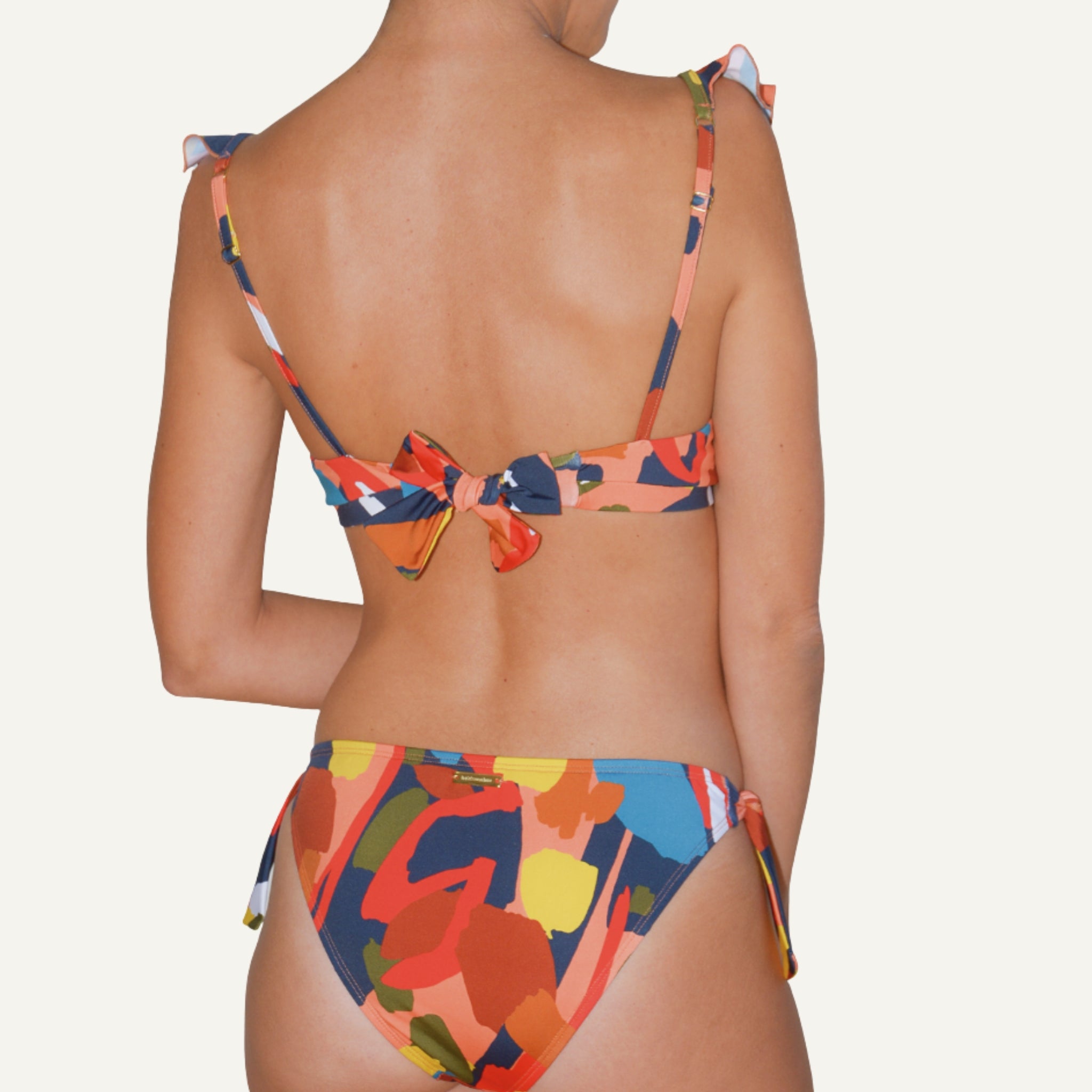 Vini multicolor maternity and nursing bikini top with ruffle straps in recycled fabric, made in Spain